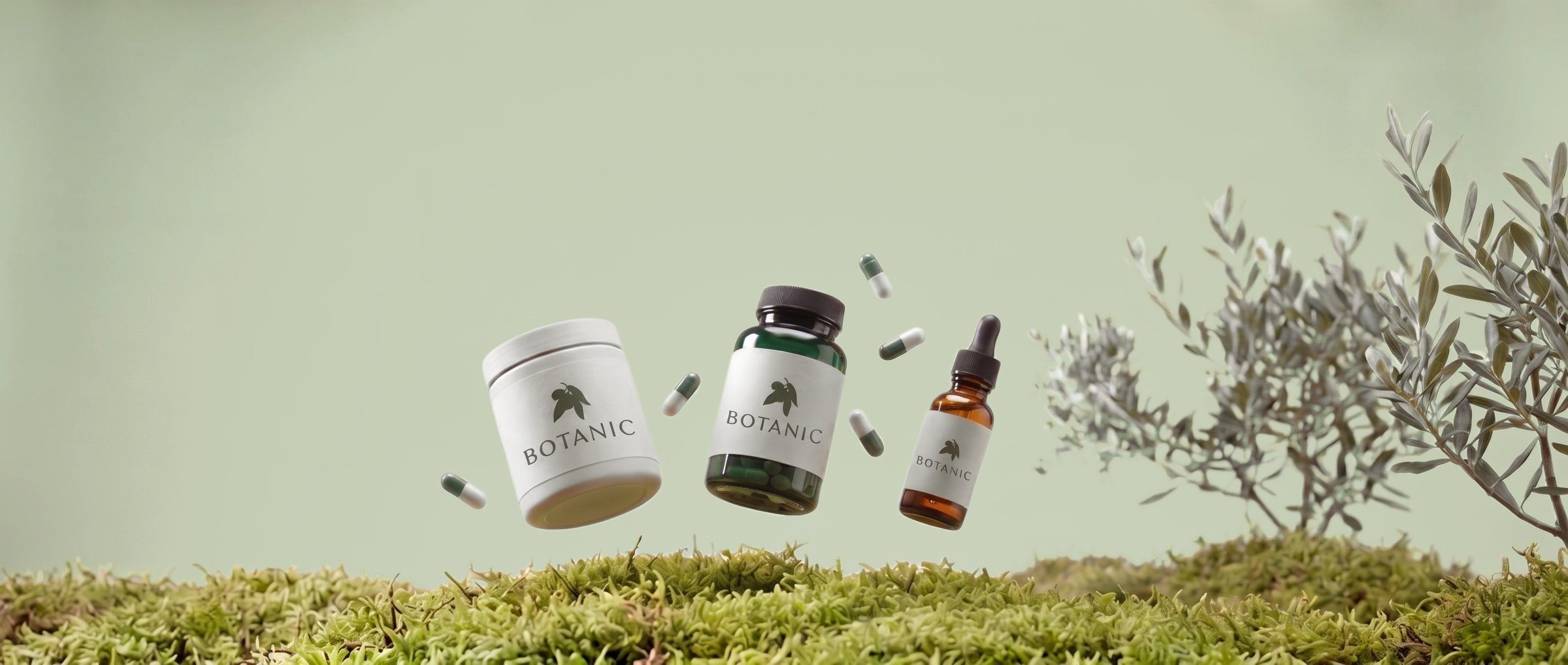 Powder tub, capsule bottle and dropper bottle floating above moss